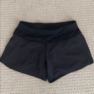 Lululemon shorts, black w/ zipped pocket on back